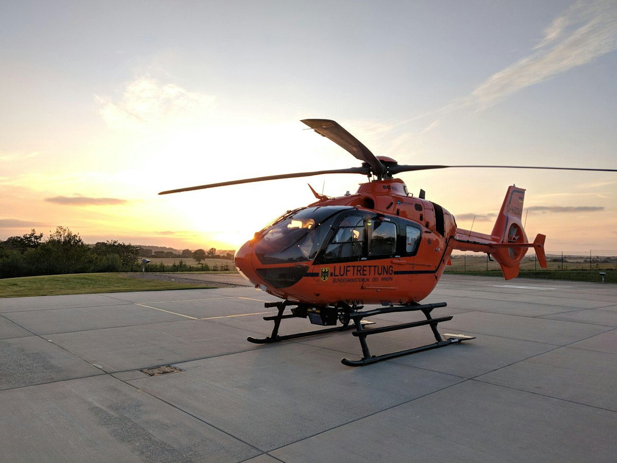 Helicopter on the apron at sunset